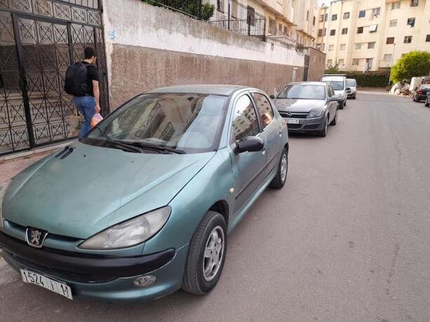 peugeot-206-6cv-model-2000-essance-big-0