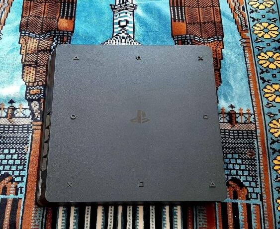 playstation-4-slim-flache-90-1000-gb-plien-jeux-0-dm-big-0